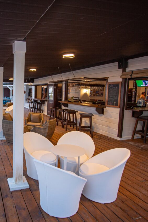 Inviting outdoor bar with comfortable seating and a relaxing atmosphere.