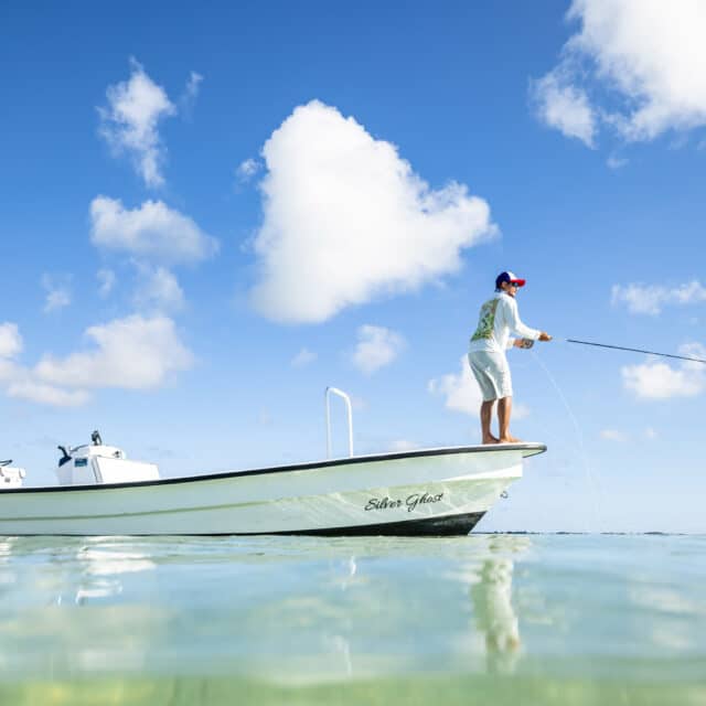 http://Enjoying%20a%20peaceful%20fishing%20trip%20under%20a%20clear%20blue%20sky.