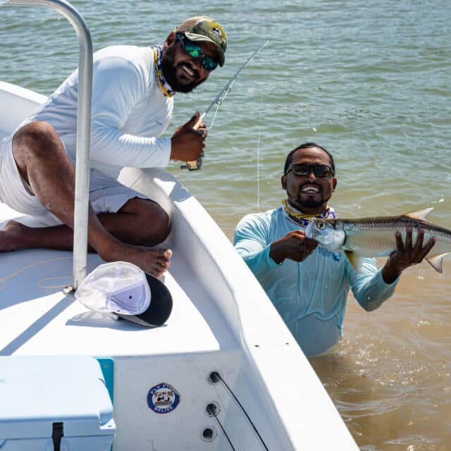 http://Exciting%20fishing%20trip%20highlighting%20a%20successful%20catch%20and%20joyful%20moments%20on%20the%20water.