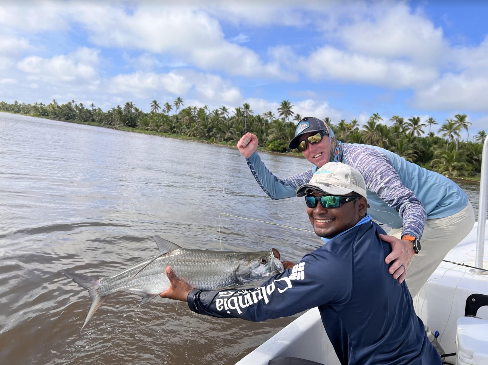 Anglers proudly display their catch during a memorable fishing adventure.