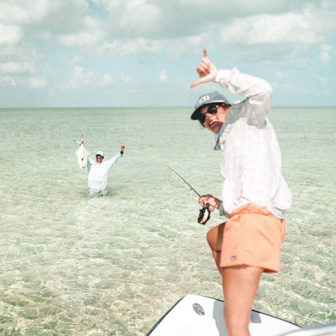 Enjoying a successful fishing trip in crystal clear waters.