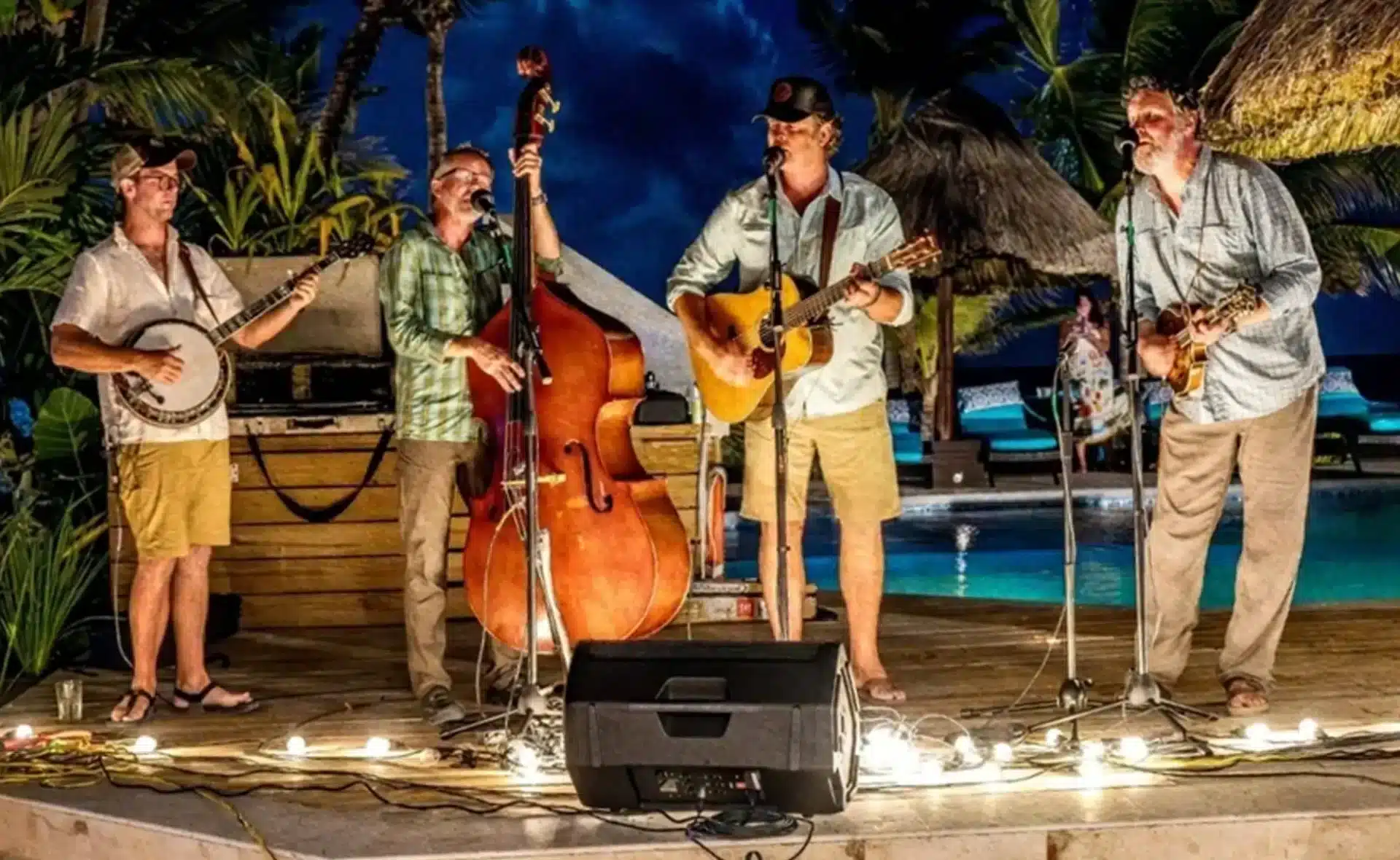 Bluegrass musicians performing on stage at El Pescador Lodge